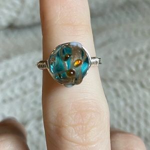 Wire wrapped bead ring.